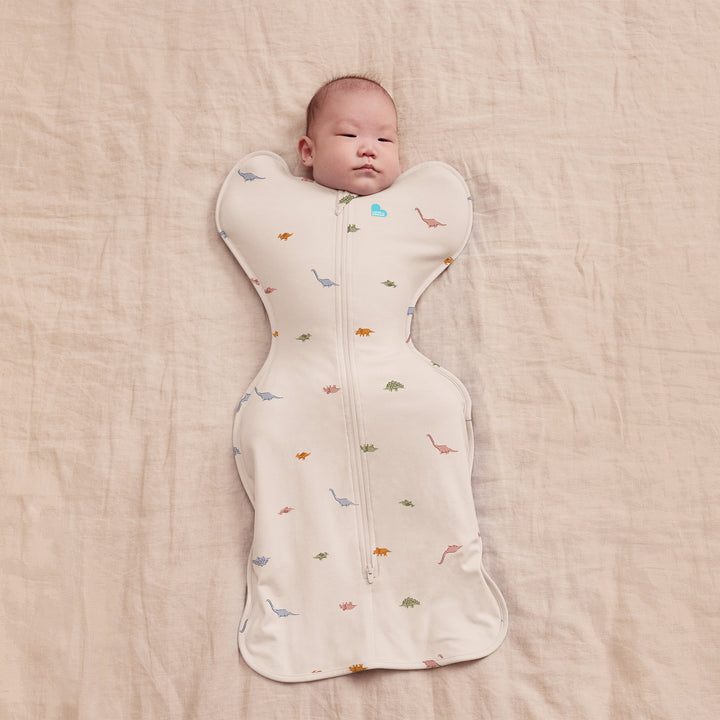 SWADDLE UP 1.0T STRETCH COTTON DINOSNORE CREAM